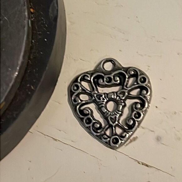 Vintage-1970s-0.75” silver tone scroll work heart charm/pendant with jump hoop - Picture 9 of 11